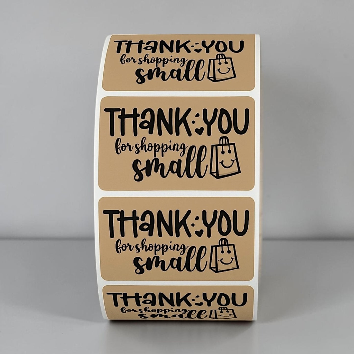 Thank You for Shopping Small kraft sticker roll on white background