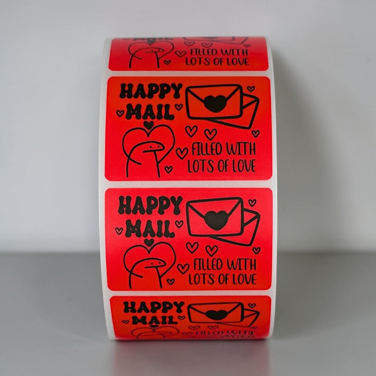 Happy Mail Filled With Lots of Love red sticker roll on white background